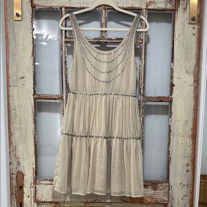 Elegant Cream Sleeveless Dress